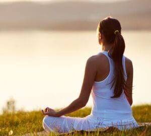 Yoga and meditation session in Sri Lanka – serene nature backdrop for mindfulness, relaxation, and spiritual rejuvenation, featured in JLK Tours wellness and holistic experiences.